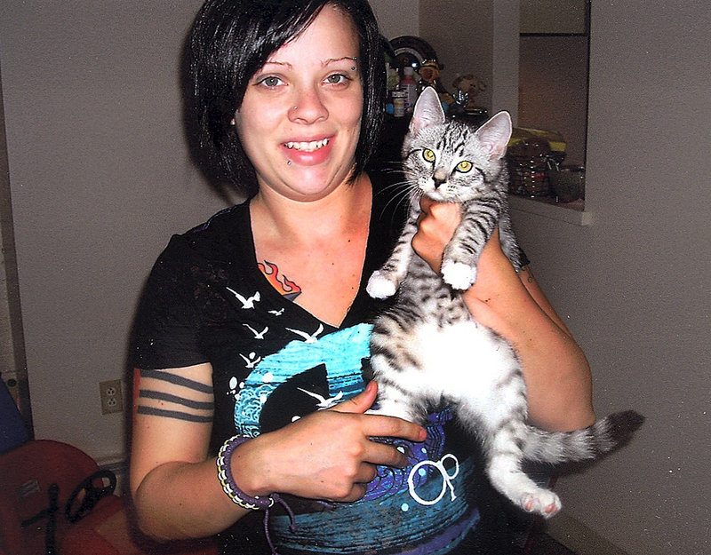 Submitted photo
Samantha Folsom holds her kitten, Gadget, in this 2010 photo.